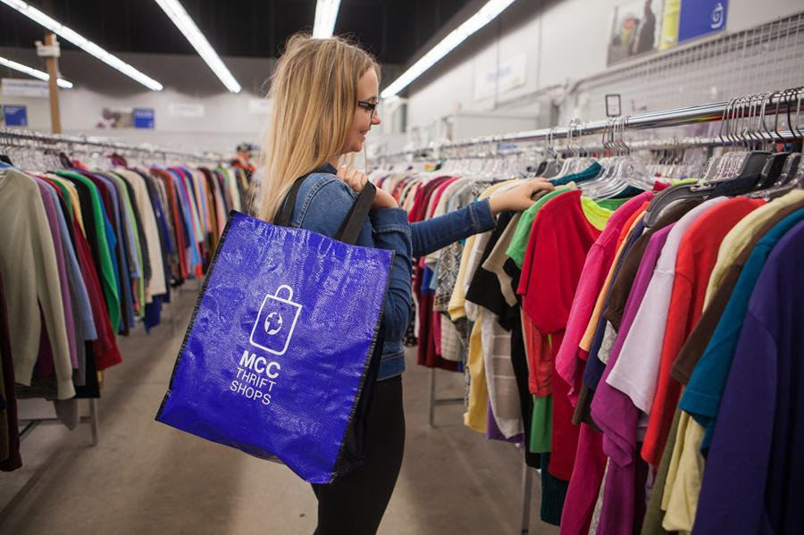A young woman shops at an MCC Thrift shop