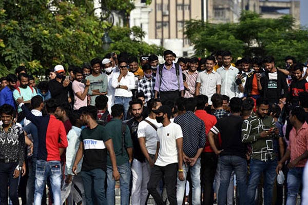 Visitors at Connaught Place's central park amid coronavirus pandemic, in New Delhi, India, on 1 August 2021.