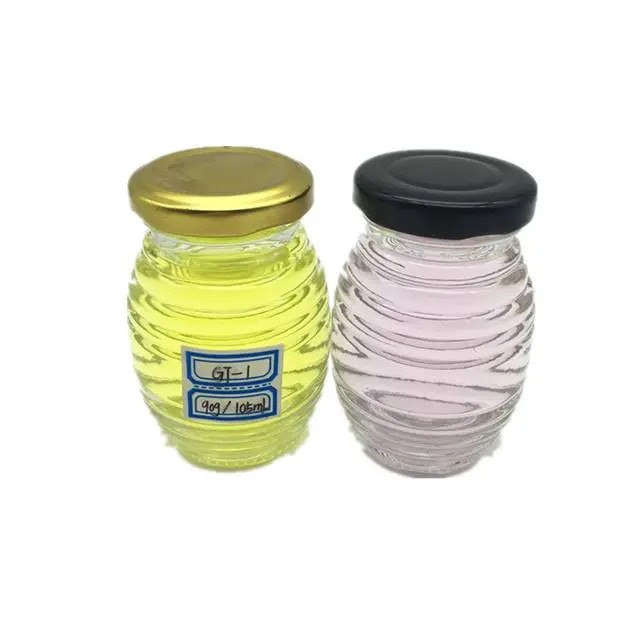 China Exquisite thread design shape 100ml honey glass jar