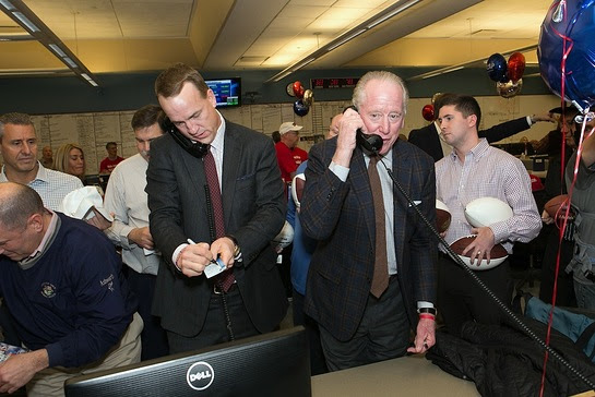 Peyton and Archie Manning took part in ICAP's 24th annual global Charity Day at its North American headquarters in Jersey City