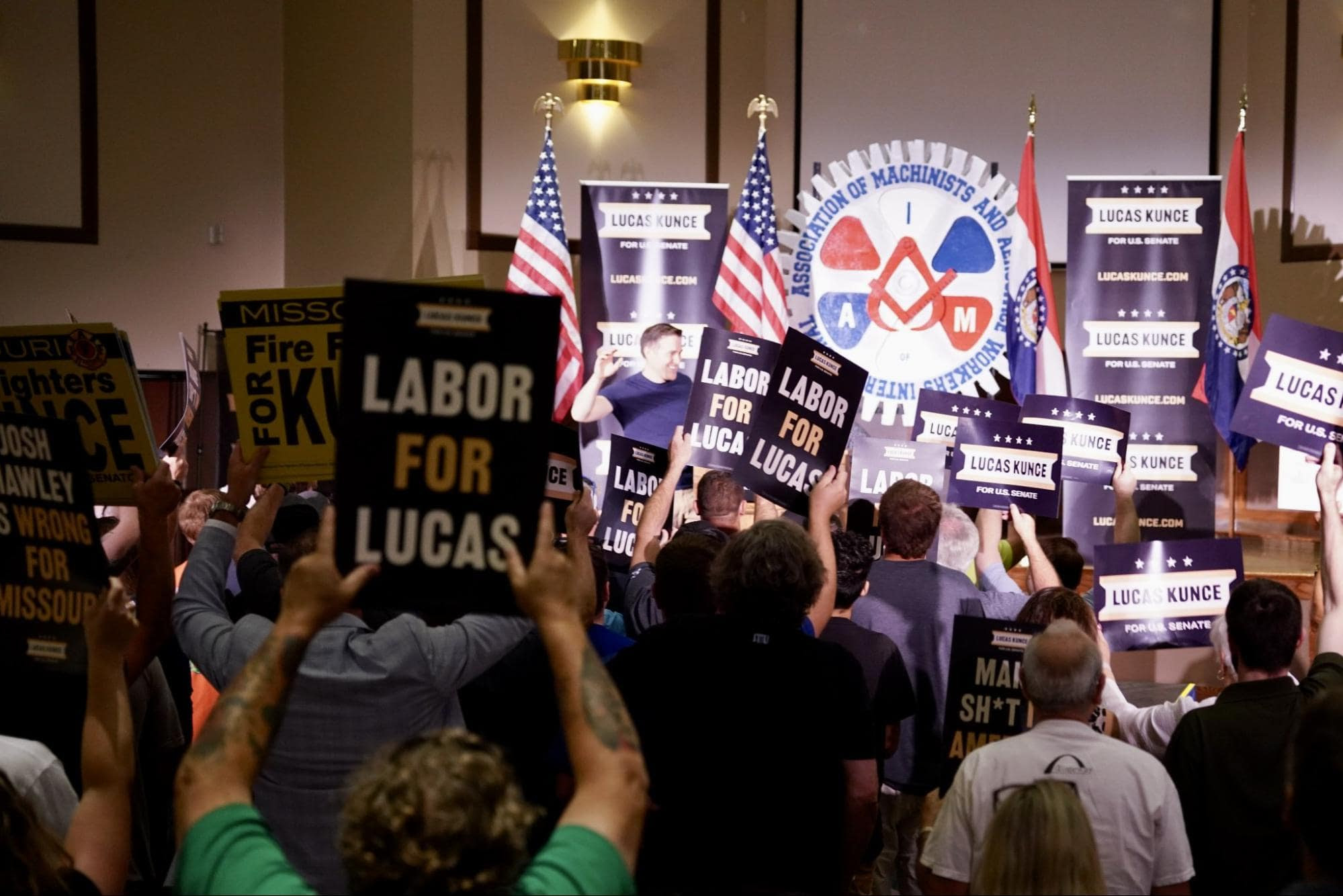 Lucas standing with local elected and union leaders at his big rally in St. Louis County.