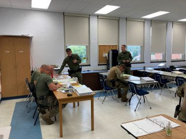 Rangers are training inside of a classroom