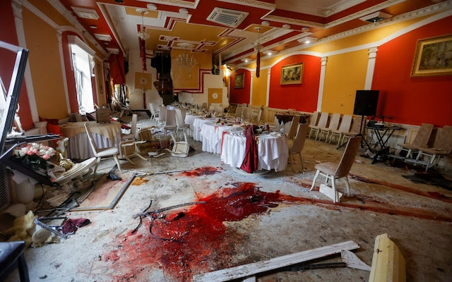 The artillery strike caused severe damage at the hotel in Donetsk.