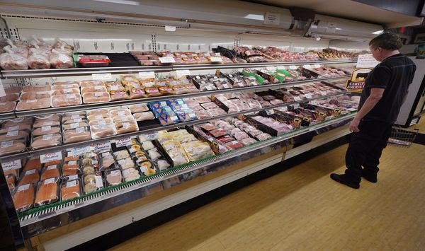 A man looks at beef in the meat department at Lambert&#39;s Rainbow Market in Westwood, Mass., in this June 15, 2021, file photo. The Labor Department said Thursday, Feb. 10, 2022, that consumer prices jumped 7.5% last month compared with a year earlier, the steepest year-over-year increase since February 1982. The acceleration of prices ranged across the economy, from food and furniture to apartment rents, airline fares and electricity. (AP Photo/Charles Krupa)