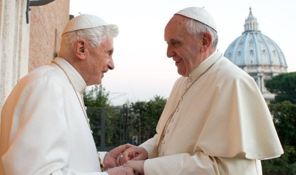 Pope Francis alongside his predecessor Pope Benedict