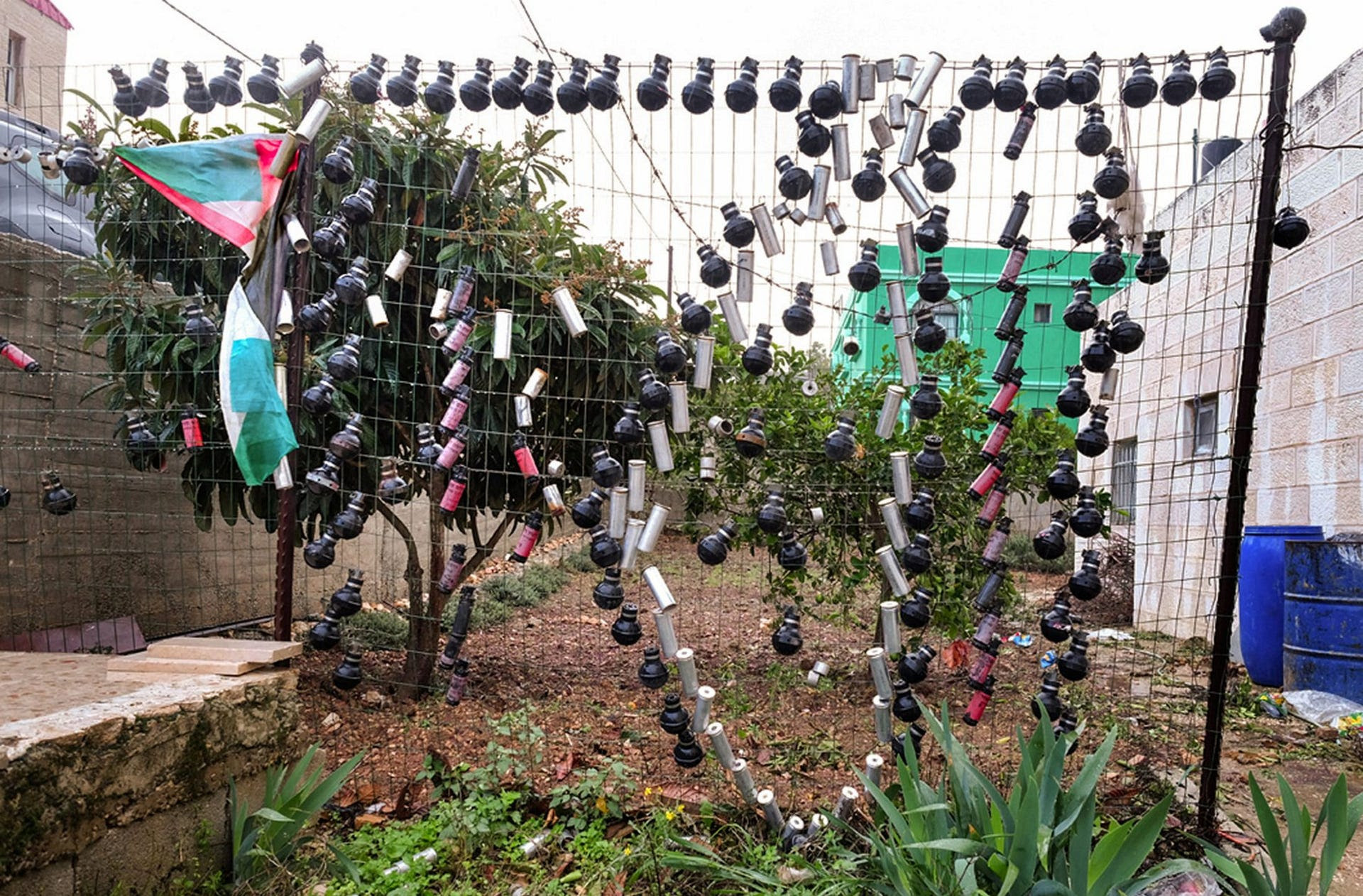 A design in the shape of a map of Palestine on a Nebi Saleh fence in 2018.