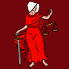 Lady Justice in a Handmaid's costume.