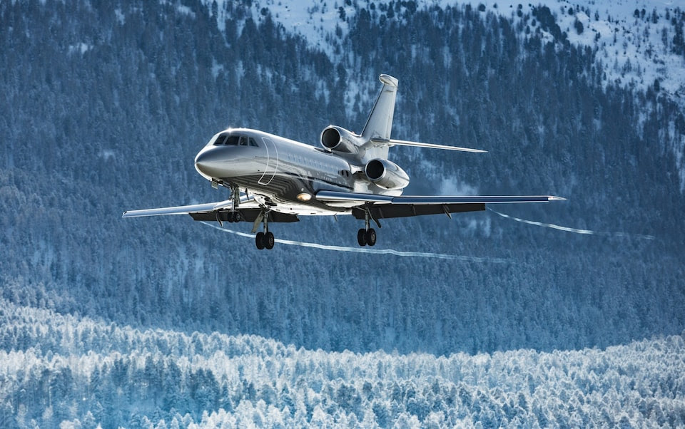 A private jet landing at a ski resort