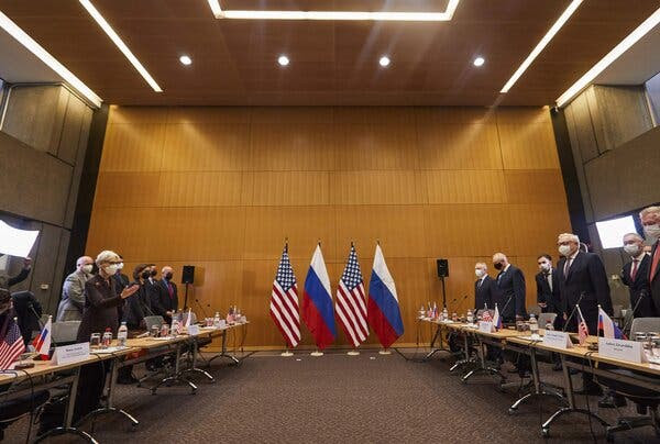 The American delegation, left, and its Russian counterparts as they met in Geneva on Monday.