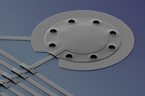 NIST researchers applied a special form of microwave light to cool a microscopic aluminum drum. Credit: Teufel/NIST