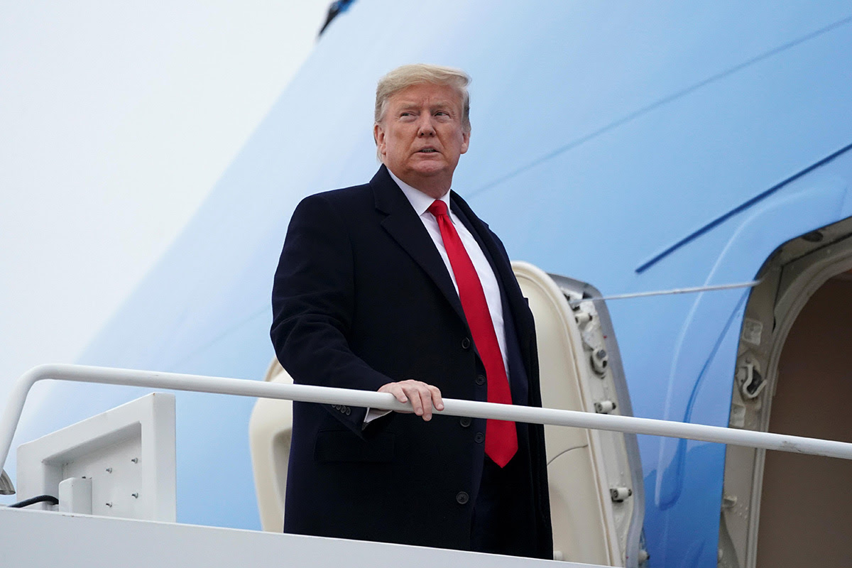 click for large image US President Donald Trump and first lady Melania Trump depart Joint Base Andrews in Maryland, US, on 13 January 2020.