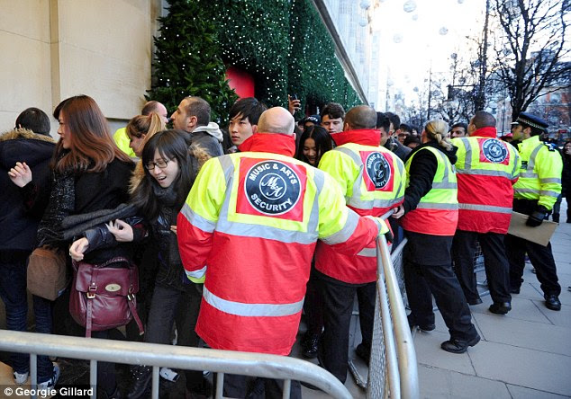 Thousands queued to be first through the doors at Selfridges in London on Boxing Day