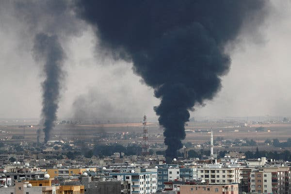 Ras al Ain, Syria, during bombardment by Turkish forces on Wednesday.