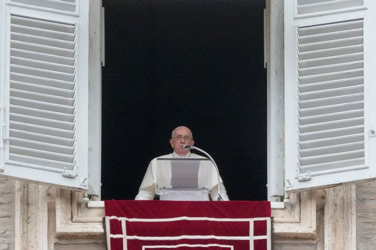 Pope Francis delivers the Angelus noon prayer in St. Peter's Square at the Vatican, Sunday