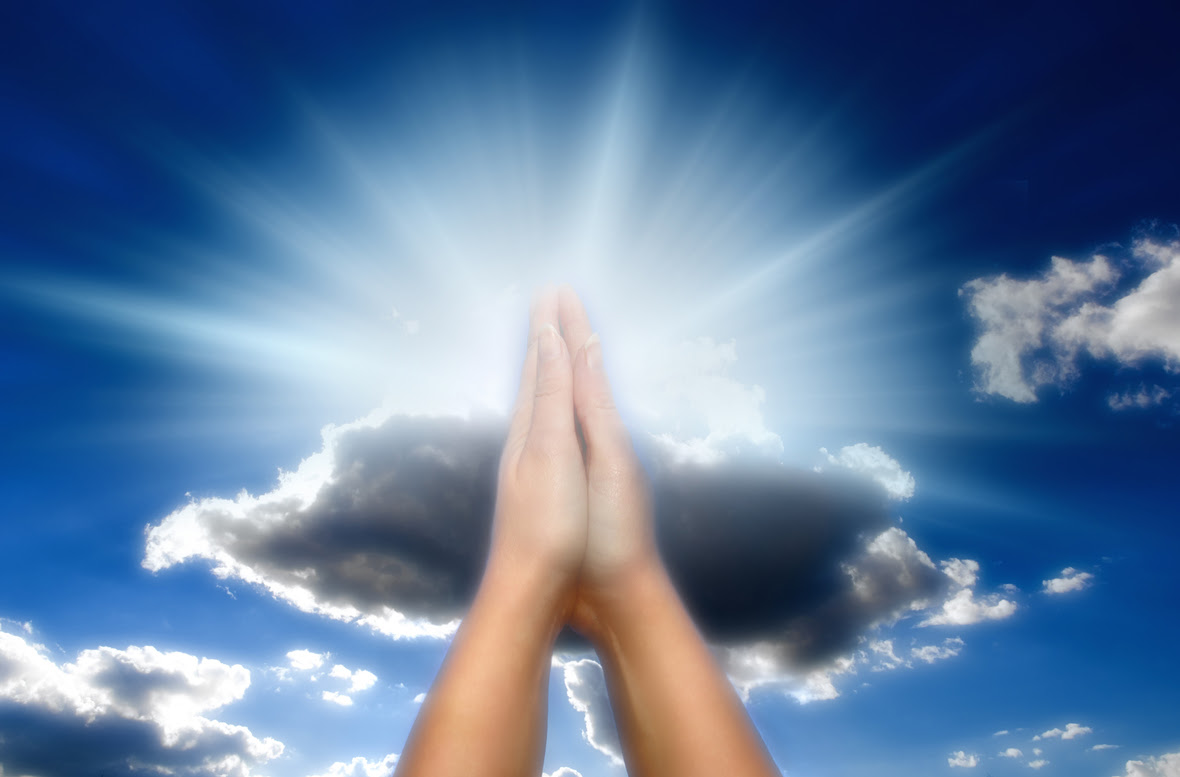 bigstock-praying-woman-over-blue-sky-wi-163792461