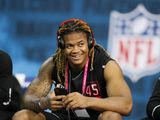 Ohio State defensive lineman Chase Young watches a drill at the NFL football scouting combine in Indianapolis, Saturday, Feb. 29, 2020. (AP Photo/Charlie Neibergall) **FILE**
