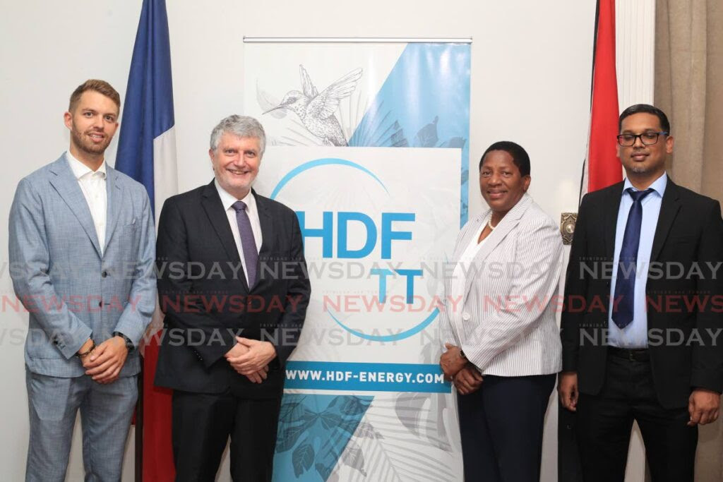 HDF executive vice president Thibault Ménage, from left, French Ambassador Didier, Planning and Development Minister Pennelope Beckles and HDF TT managing director Dale Ramlakhan at the launch of HDF's operation in TT at the French Embassy on November 4. - ROGER JACOB