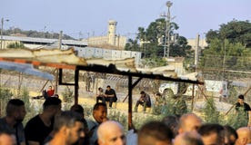 Palestinian workers at an Israeli checkpoint in Tulkarm, last month in the West Bank