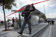 Police at the scene where an Arab terrorist stabbed a Jerusalem yeshiva student near a Light Rail station on October 8, 2015.
