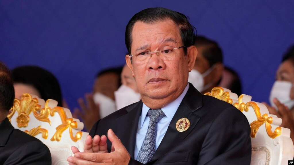 FILE: Cambodian Prime Minister Hun Sen claps during the 71st anniversary celebration of the Cambodian People's Party (CPP) at its headquarters in Phnom Penh, Cambodia, Tuesday, June 28, 2022. (AP Photo/Heng Sinith)