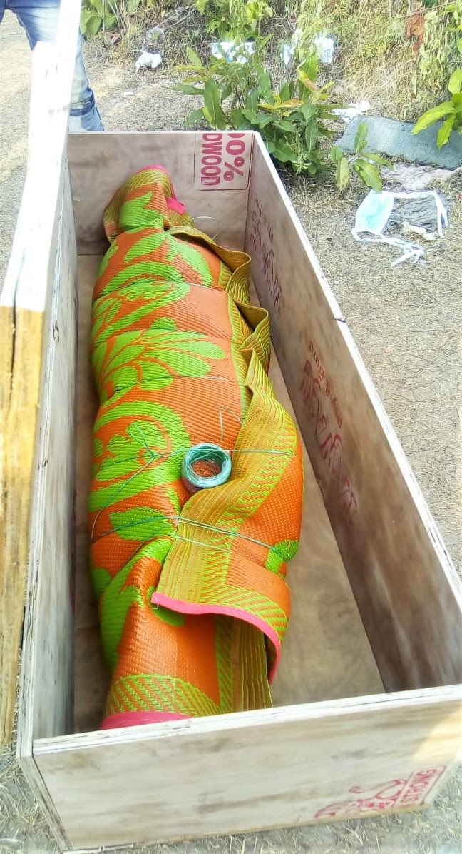  Sambaru Madkami’s coffin before burial. (Morning Star News)