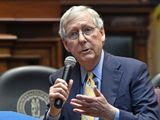HOLD FOR STORY- FILE - In this Oct. 7, 2019, file photo, Senate Majority Leader Mitch McConnell, R-Ky., addresses the Kentucky chapters conference of The Federalist Society at the Kentucky State Capitol in Frankfort, Ky. McConnell is up for reelection in November 2020. (AP Photo/Timothy D. Easley, File)