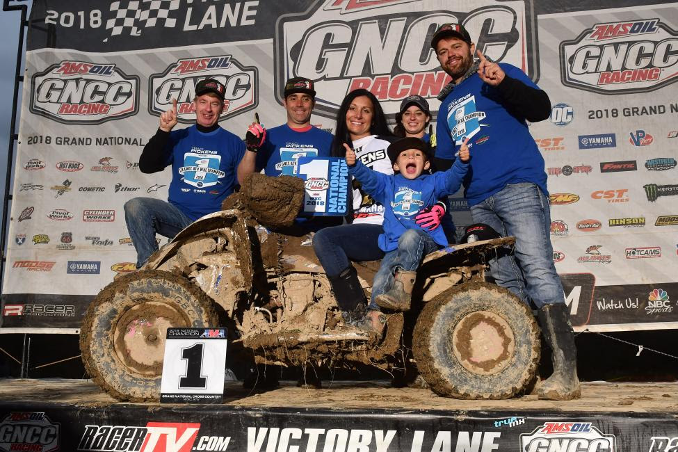 Traci Pickens pictured with her family and crew took home her 11th WXC National Championship.