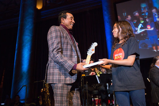 Smokey Robinson receiving the Rocker of the Year award at the 2016 Little Kids Rock Benefit.