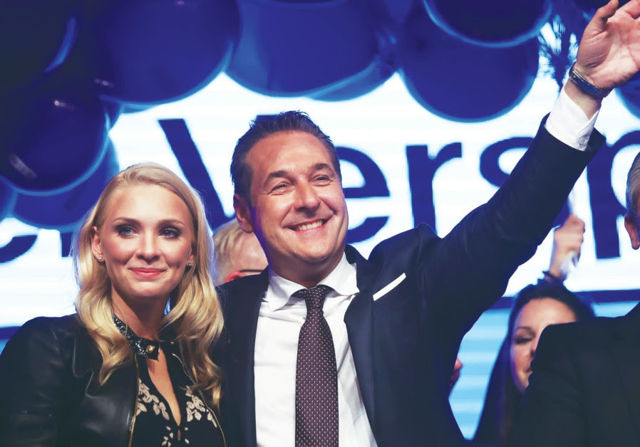 Heinz-Christian Strache, the head of the far-right Freedom Party, celebrates in Vienna with his wife