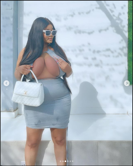 Endowed Instagram star, Ada La Pinky commands attention as she flaunts her massive boobs in revealing dress (photos)