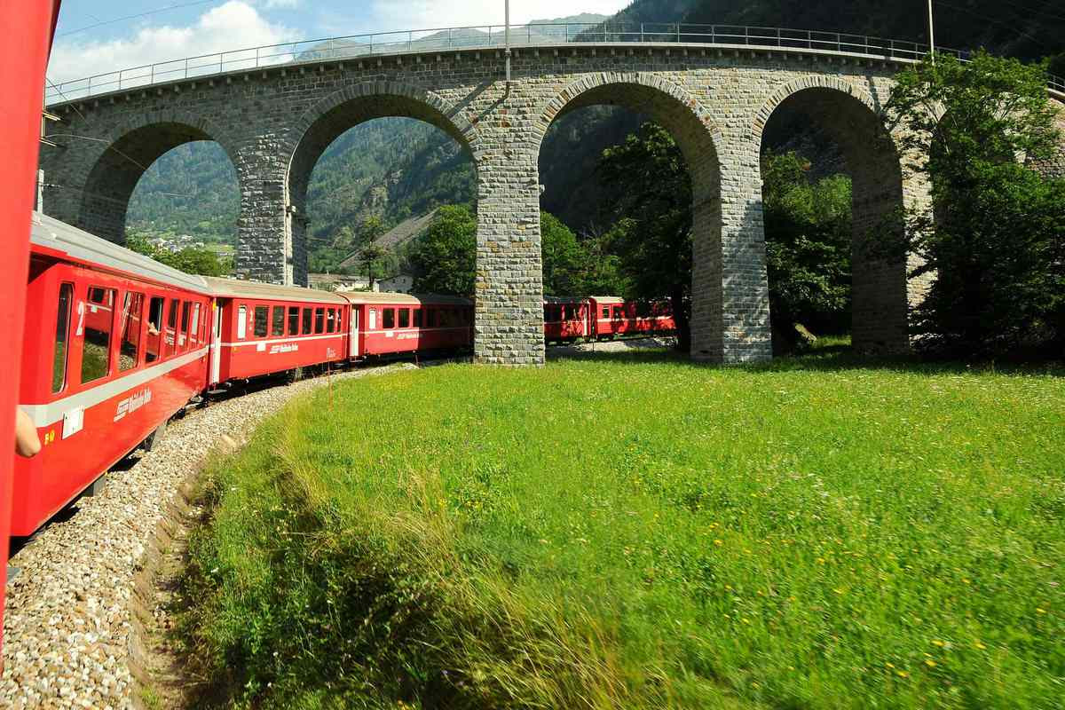 Bernina Railway, Switzerland
Bridge
tunnel
train
Mountains side
Grass

