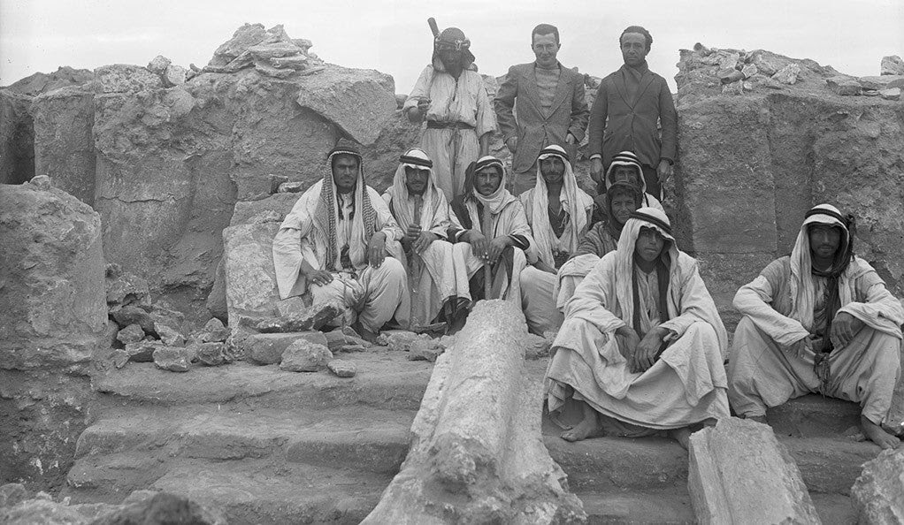 A photograph of archaeologist Frank Brown and his crew during a 1934-1935 excavation in Dura-Europos, Syria.