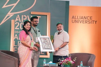 Renowned Author and Mythologist Devdutt Pattanaik (extreme right) being felicitated by Abhay G. Chebbi, Pro-Chancellor (centre), Alliance University and Anubha Singh, Vice-Chancellor, Alliance University at the Asia Pacific Literary Festival 2022