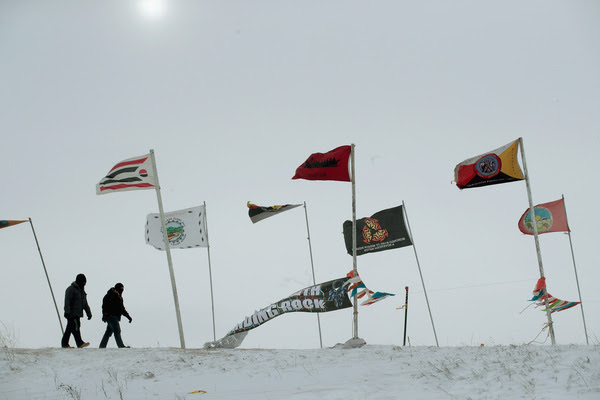 Activists fight the wind as
                                        they walk around the Standing
                                        Rock Sioux Reservation on
                                        December 2016 outside Cannon
                                        Ball, North Dakota. (Scott
                                        Olson/Getty Images)