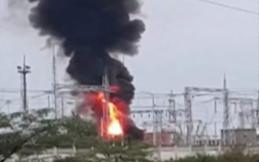 Smoke rises above a transformer electric substation in Crimea.