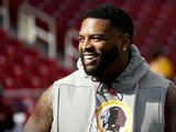 Washington Redskins offensive tackle Trent Williams (71) takes the field for warms up before an NFL football game against the Dallas Cowboys Sunday, Oct. 21, 2018, in Landover, Md. (AP Photo/Andrew Harnik) ** FILE **