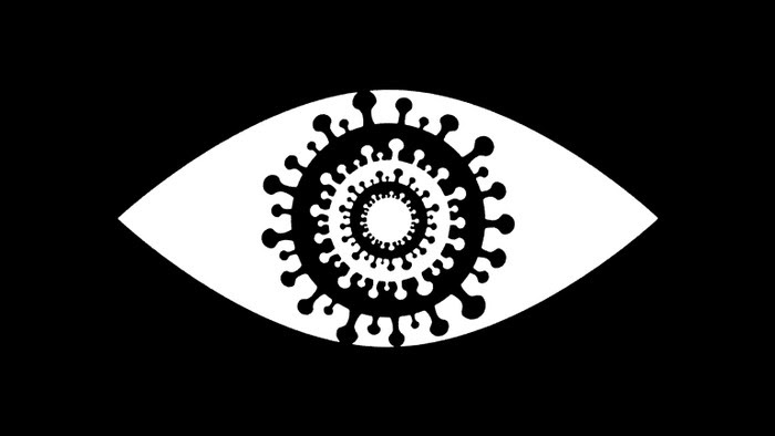 An eye with a coroanvirus as the pupil
