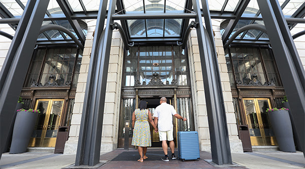 Couple entering hotel