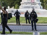 Police guard Robert E. Lee Statue in Richmond, Va., Monday, June 1, 2020. (Daniel Sangjib Min/Richmond Times-Dispatch via AP)