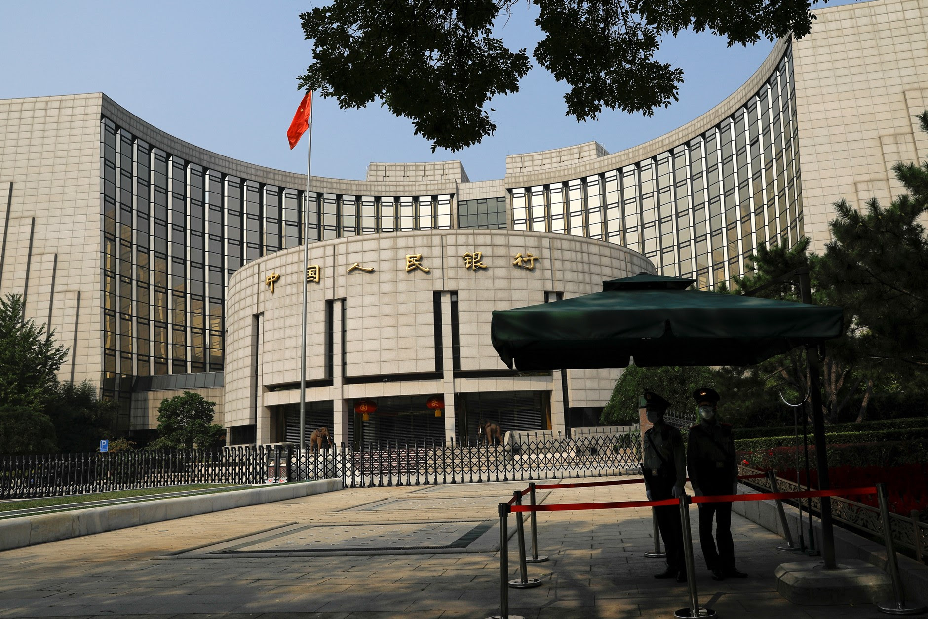 China holds lending rates steady.