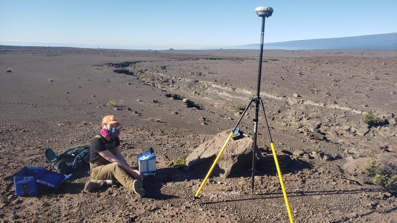 Color photograph of scientist in the field