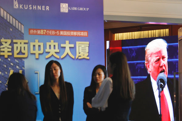 A reception desk at a Shanghai event on Sunday promoting investment with Kushner Companies.
