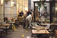 Israeli security forces at the scene where two terrorists opened fire at civilians in the Sarona Mall in Tel Aviv