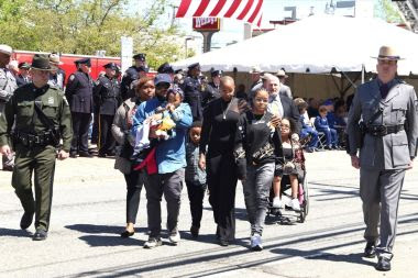 ECO and State Police walk with family of fallen officer