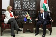 Palestinian Authority Acting President Mahmoud Abbas (R) with European Union foreign policy chief Federica Mogherini،in Ramallah. November 8, 2014.