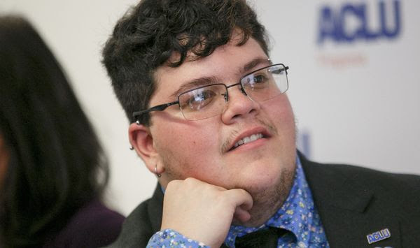 Gavin Grimm, who has become a national face for transgender students, speaks during a news conference held by the ACLU and the ACLU of Virginia at Slover Library in Norfolk, Va. The Supreme Court has rejected a Virginia school board&#39;s appeal to reinstate its transgender bathroom ban. Over two dissenting votes, the justices on Monday, June 28, 2021, left in place lower court rulings that found the policy unconstitutional. (Kristen Zeis/The Daily Press via AP, File)