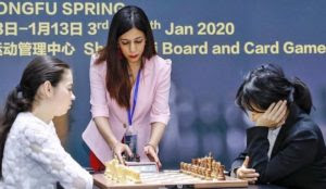 Iranian chess referee fears to return to Tehran after being photographed without hijab