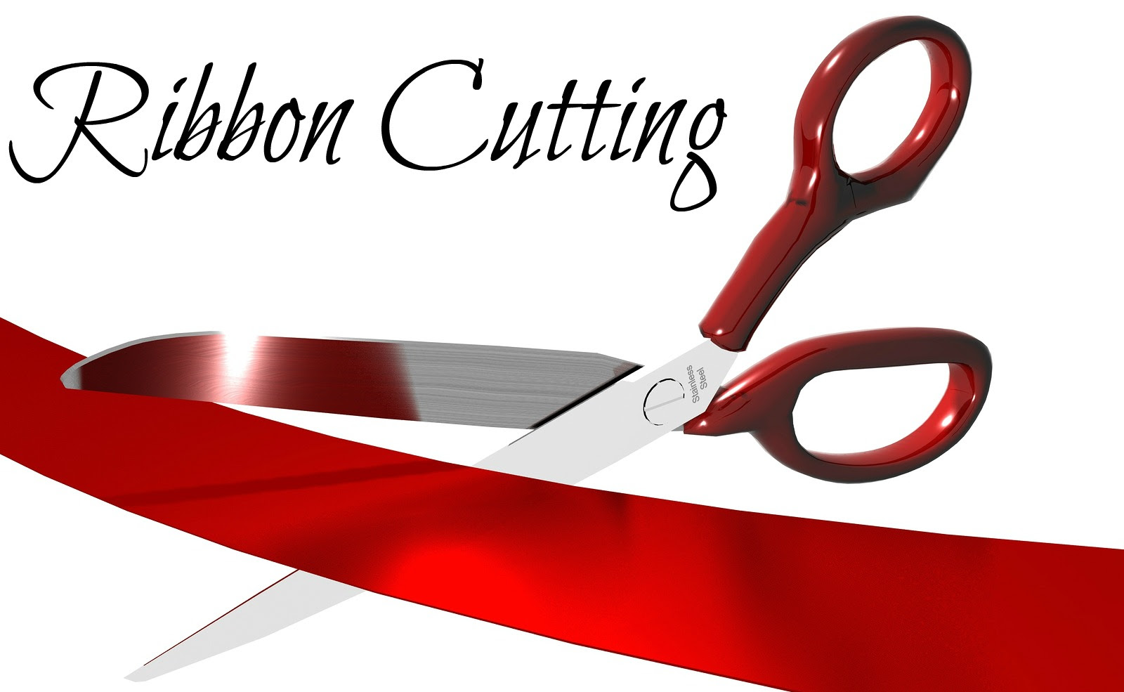 A red scissors cutting a red ribbonDescription automatically generated