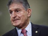 Sen. Joe Manchin, D-W.Va., speaks with reporters after President Donald Trump was acquitted in an impeachment trial on charges of abuse of power and obstruction of Congress on Capitol Hill in Washington, Wednesday, Feb. 5, 2020. (AP Photo/Patrick Semansky)