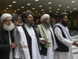 In this May 28, 2019, photo, Mullah Abdul Ghani Baradar, the Taliban group&#39;s top political leader, second left, arrives with other members of the Taliban delegation for talks in Moscow, Russia. U.S. peace envoy Zalmay Khalilzad held on Saturday, Dec. 7, 2019, the first official talks with Afghanistan&#39;s Taliban since last September when President Donald Trump declared a near-certain peace deal with the insurgents dead. (AP Photo/Alexander Zemlianichenko) **FILE**